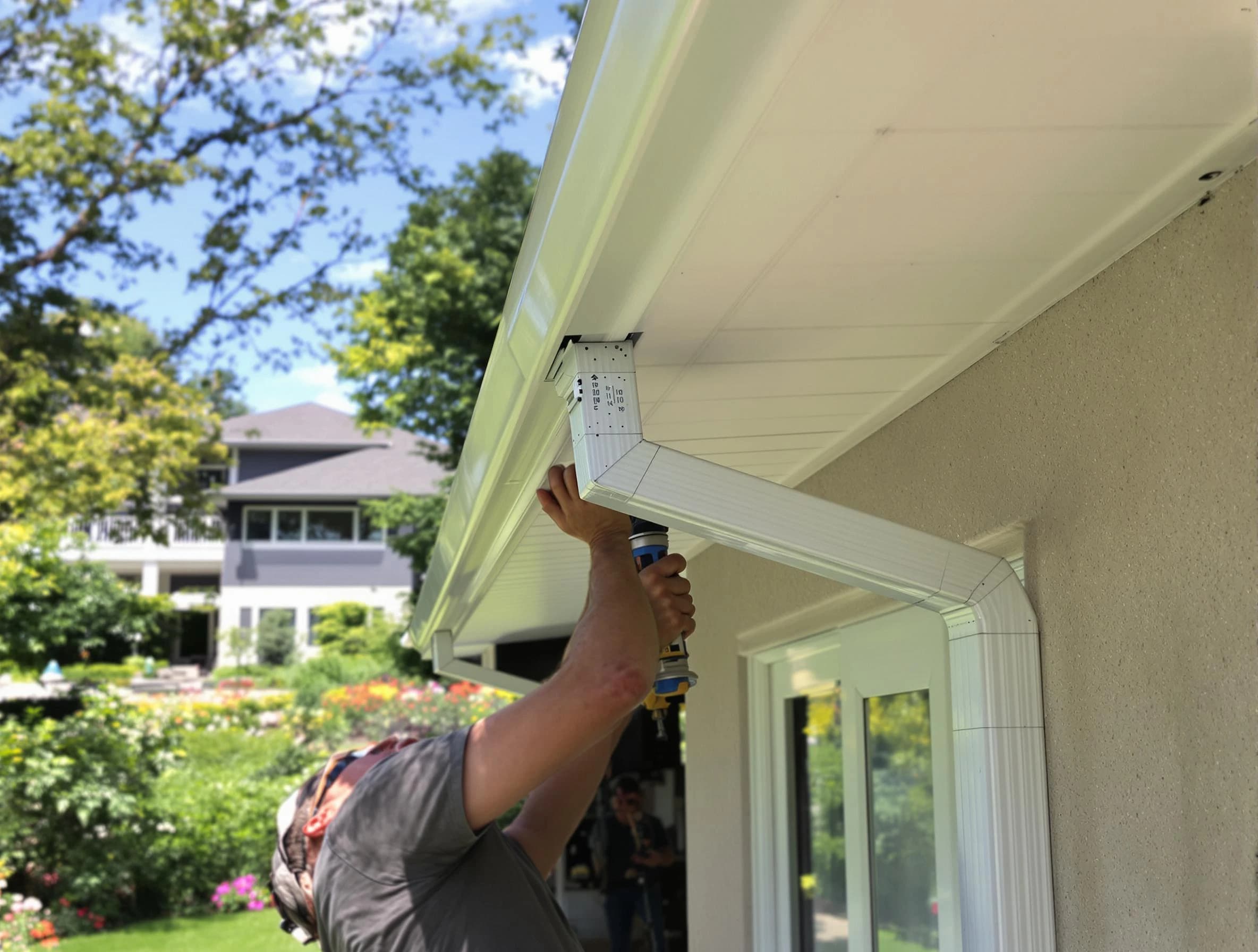 Strongsville Roofing Company technicians performing gutter installation in Strongsville, OH