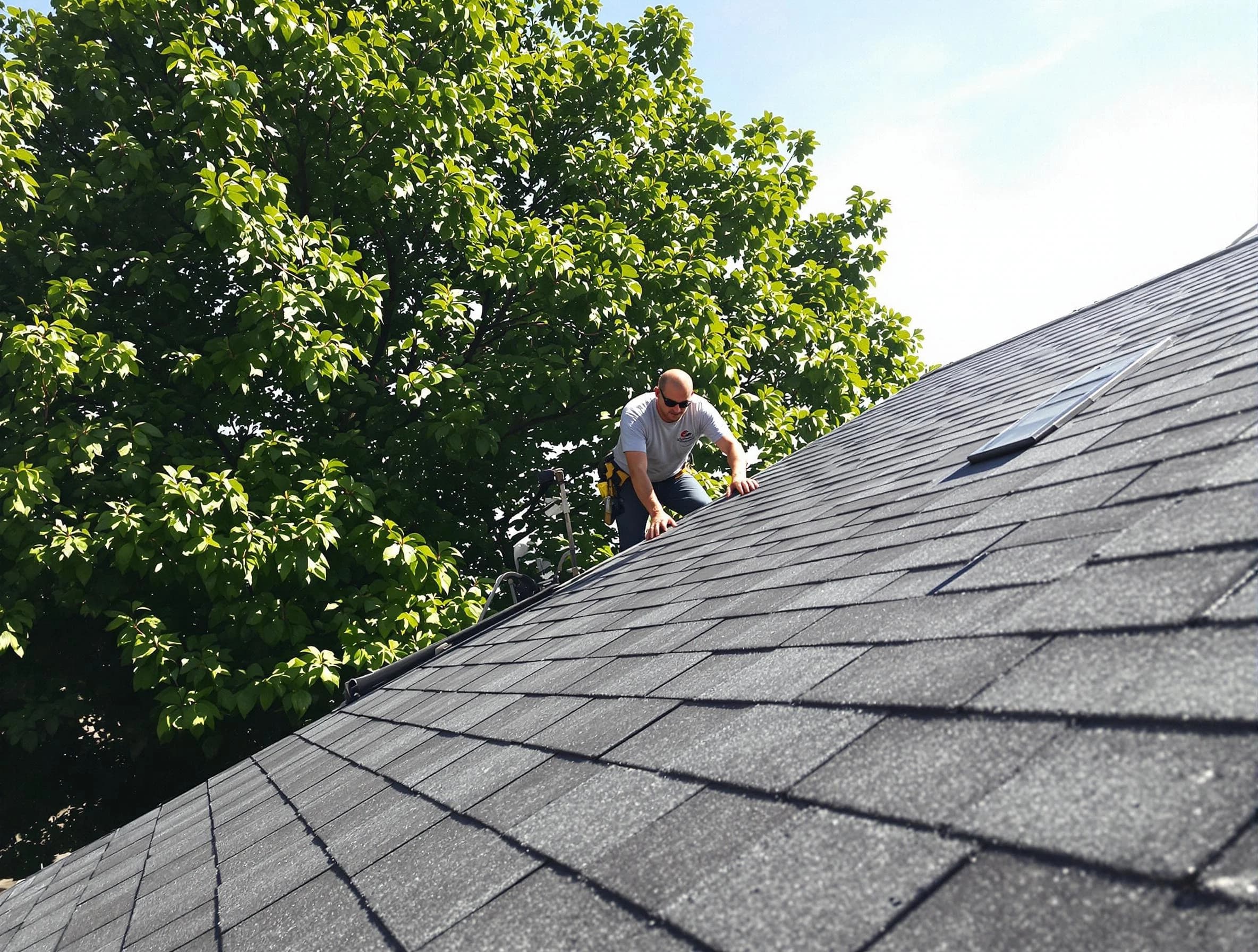 Certified roofers from Strongsville Roofing Company working in Strongsville, OH